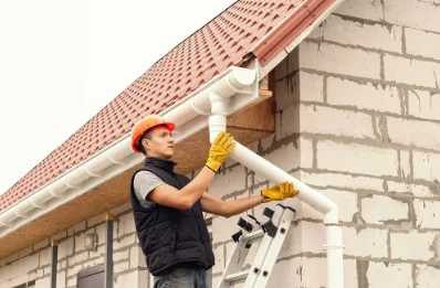 Pose et remplacement de gouttières à Housset